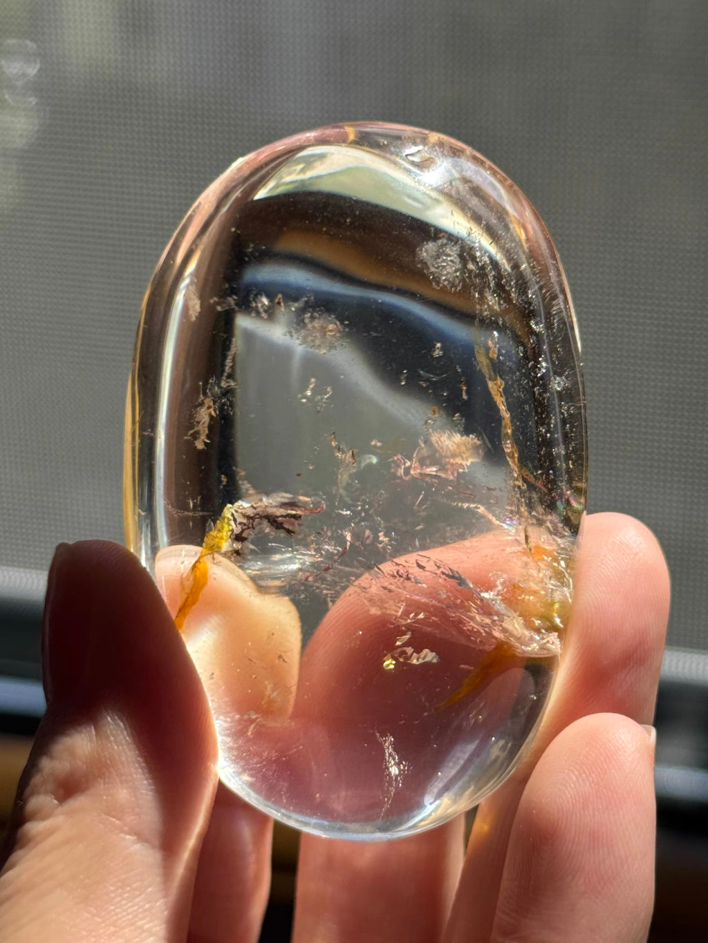 Polished Oval Clear Crystal Palm Stone with Golden Rutile Thread Inclusion, Smooth Handheld Pocket Mini Decor Specimen
