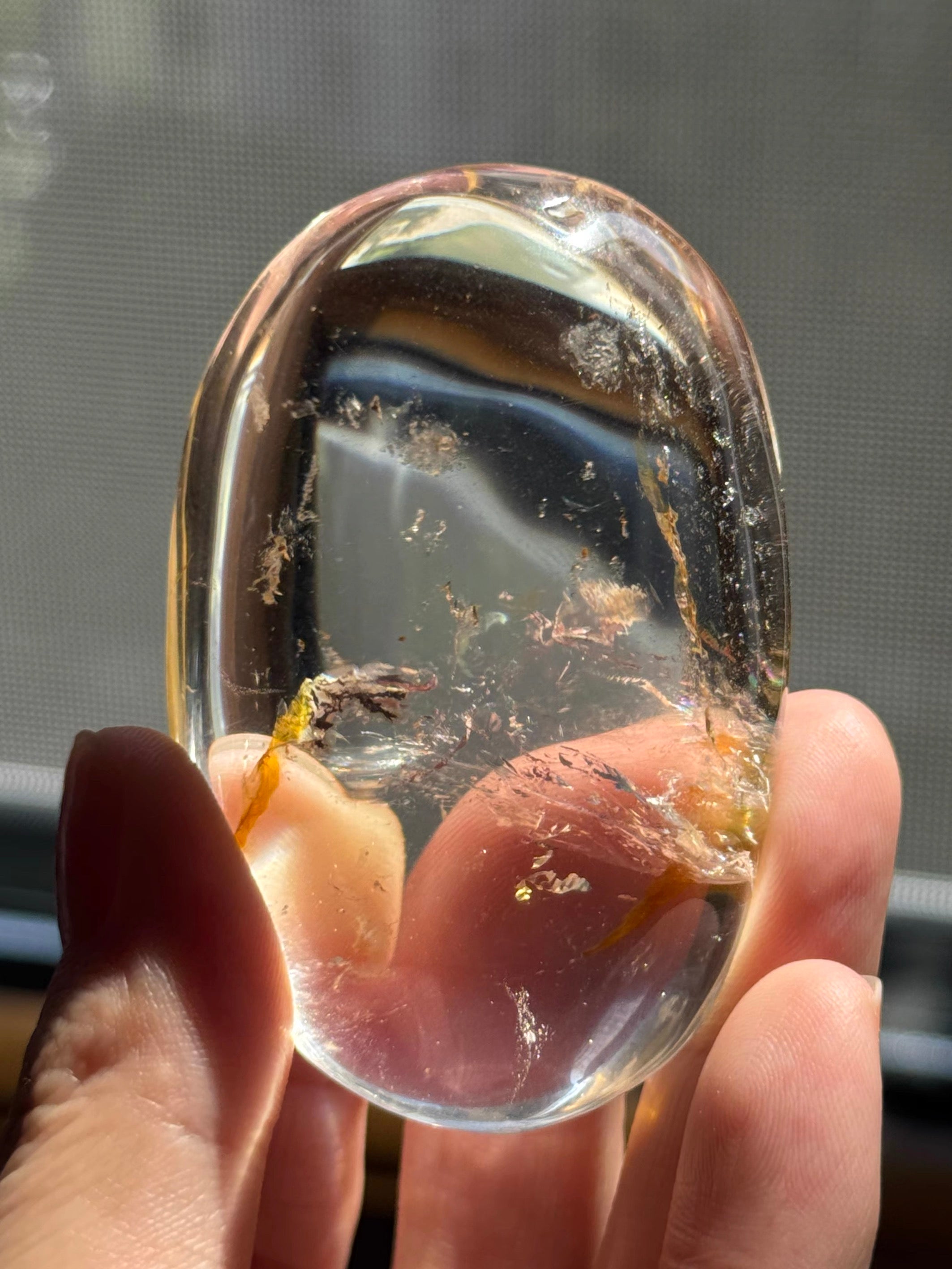 Polished Oval Clear Crystal Palm Stone with Golden Rutile Thread Inclusion, Smooth Handheld Pocket Mini Decor Specimen