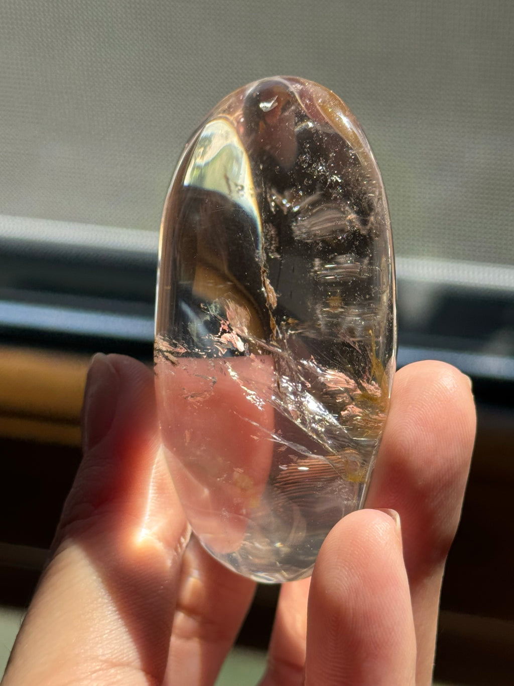 Polished Oval Clear Crystal Palm Stone with Golden Rutile Thread Inclusion, Smooth Handheld Pocket Mini Decor Specimen